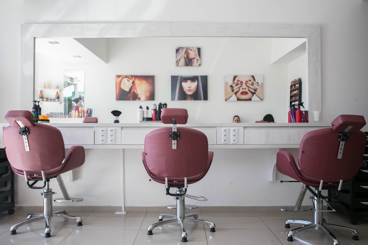 The Clubhouse barbershop interior with premium leather chairs